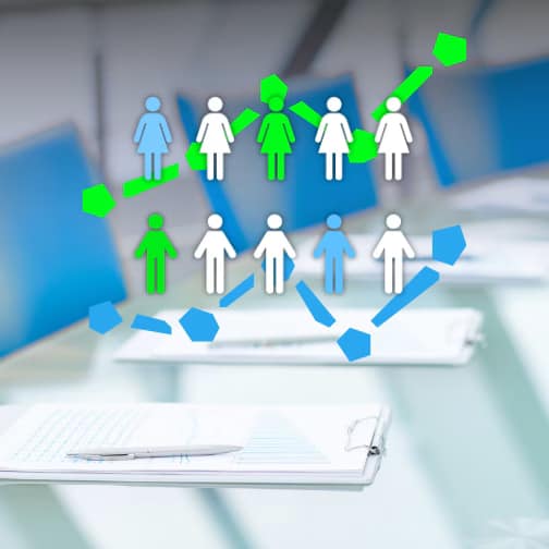 Image of clipboards on a table during a meeting. Silhouettes representing demographic data are displayed over the previously mentioned image